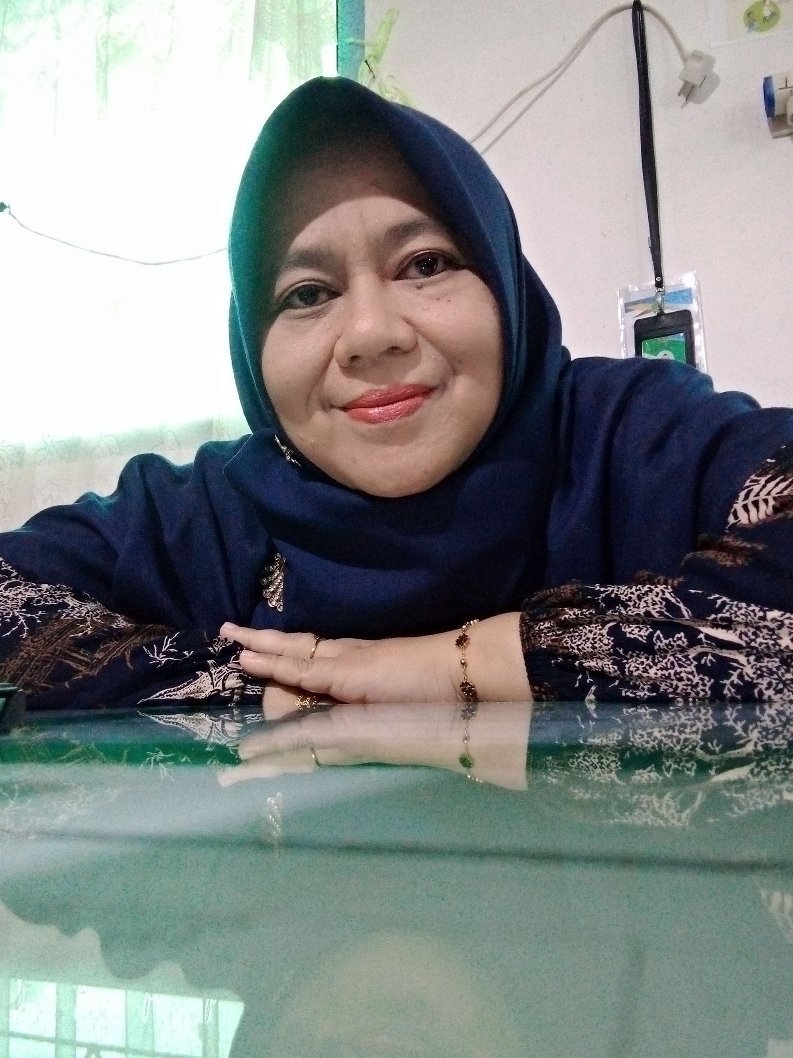 Neni Gusmeri, S.Pd.I